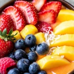 Tropical Smoothie Bowls with fresh fruit and granola